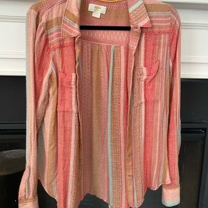 From anthropology, never worn. Size small.